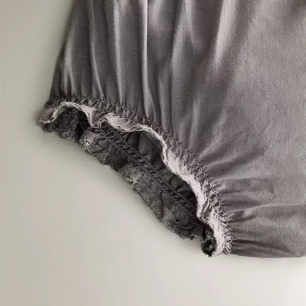 CONJUNTO CAMISA E TAPA-FRALDAS FOLHO