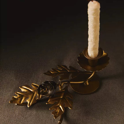 CANDELABRO DE METAL COM FOLHAS DE NATAL