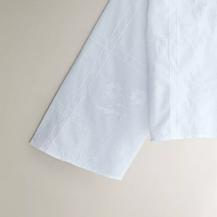 CAMISA DE ALGODÃO COM BORDADOS DE FLOR